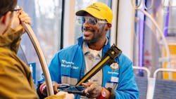 Sound Transit fare ambassador on train. Sound Transit fare ambassador on train.