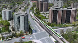 A rendering showing an aerial view of the elevated section of the Eglinton Crosstown West Extension.