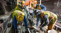Crews repaired concrete slabs along the Red Line track area.