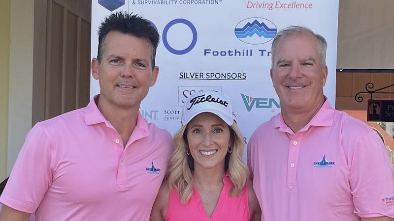 Rays the Mark founders Ray Melleady, left, and March Aesch, right, with 2023 Honoree Lauren Cochran Scoville at the 2023 Golf Outing.