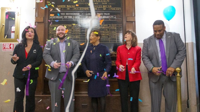 Greensboro Transit Agency officials celebrate the agency’s first crosstown bus route.