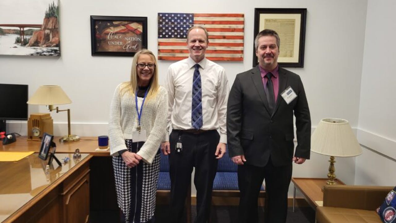 Left to right: Arrowhead Transit's Assistant Director of Administration Colette Hanson, Sen. Robert Farnsworth (R-MN-07), Arrowhead Transit Director Brandon Nurmi.