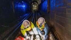 Crews performed track work in the underground tunnel of the Orange Line. Crews performed track work in the underground tunnel of the Orange Line.