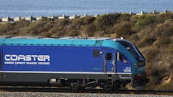 San Diego, CA, November 22, 2023: A Coaster commuter train travels through Los Penasquitos Lagoon south of Del Mar on Wednesday, November 22, 2023.