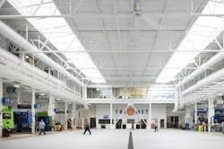 People moving around the shop floor of the new Powell Garage. People moving around the shop floor of the new Powell Garage.