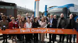 FTA Acting Administrator Veronica Vanterpool holds scissors for ribbon-cutting at Community Transit Swift Orange Line opening ceremony at Lynnwood Transit Center.