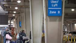 Travelers navigate the Uber/Lyft rideshare area in Terminal 1 at the MSP airport on March 22.