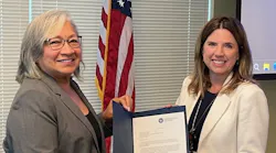 Sonya Proctor (left), TSA assistant administrator for surface operations, presents the TSA Gold Standard Award for security to LYNX CEO Tiffany Homler Hawkins (right) at a ceremony in Orlando, Fla., on April 3..