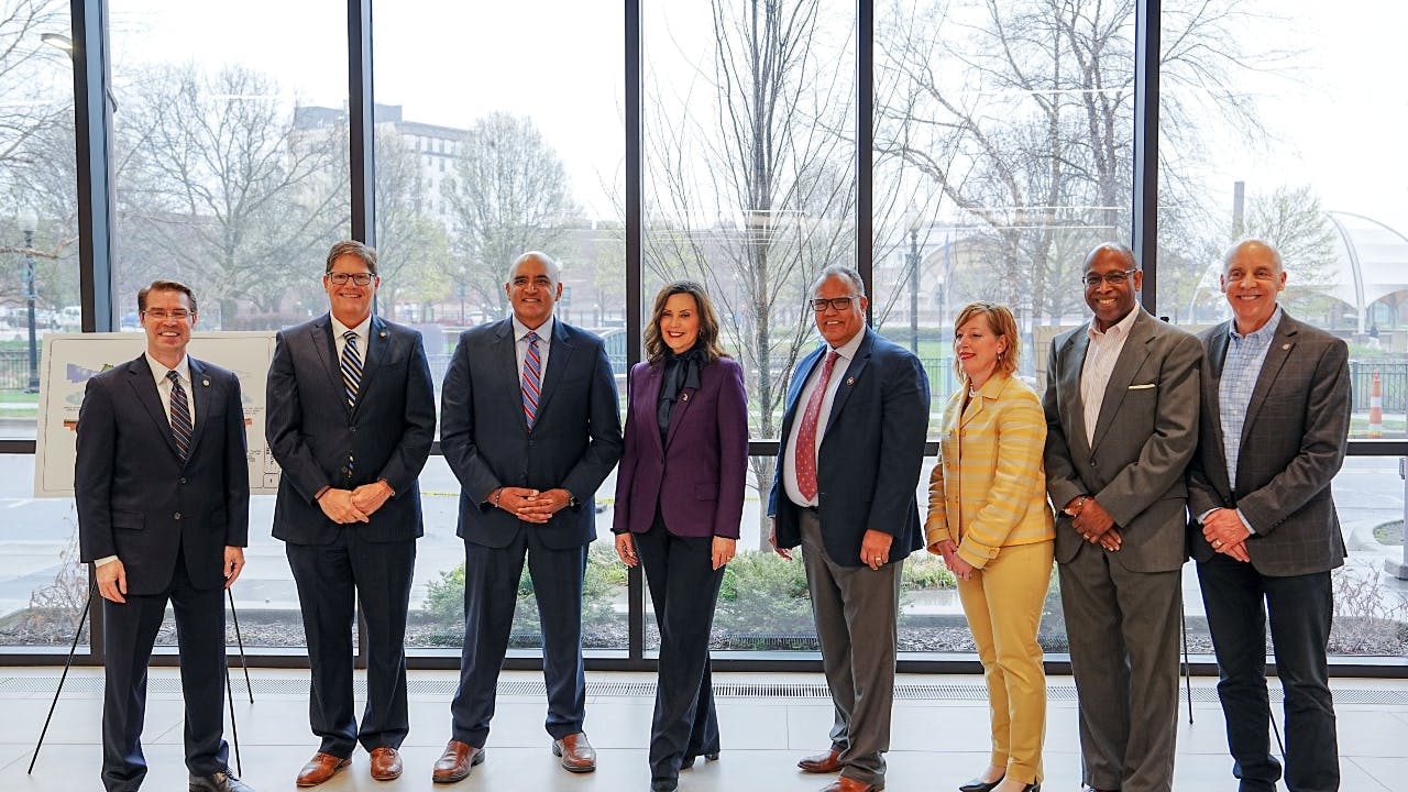 FHWA Administrator Shailen Bhatt joins officials from the city of Kalamazoo, Mich., to celebrate nearly $38 million in PROTECT grant funding.