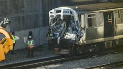 A damaged CTA Yellow Line &apos;L&apos; train is seen from a passing train at the Howard Rail Yard in Chicago&apos;s Rogers Park on Nov. 17, 2023. The train crashed into a snowplow train the day before, leading to suspension of service on the Yellow Line.