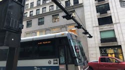 An MTA commuter bus passed underneath overhead congestion pricing readers north of 60th Street in Manhattan. MTA officials hinted New Jersey could receive money to mitigate traffic and pollution problems, similar to what&apos;s been commit for the Bronx.