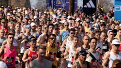 The first wave of runners at the start of the Boston Marathon in Hopkinton Monday.