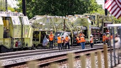 An Amtrak Track Laying System installs new concrete ties and clips the new rail in place. Amtrak is undertaking a $122 million track renewal project between Harrisburg and Lancaster. May 1, 2024.