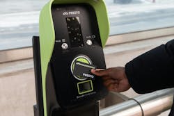 A PRESTO Card being swiped against a PRESTO fare reader. A PRESTO Card being swiped against a PRESTO fare reader.