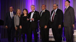 U.S. Rep. Early Blumenauer (center), accepts the APTA Congressional Legacy Award for his commitment to advancing public transportation throughout his career. Rep. Blumenauer is joined on stage with (L-R) APTA President and CEO Paul Skoutelas, CEO of Regional Transportation Commission of Southern Nevada and APTA Board Vice Chair MJ Maynard, APTA Board Chair Michele Wong Krause, TriMet General Manager Sam Desue, President of Chicago Transit Authority and APTA Board Immediate Past Chair Dorval Charter and Director, Contracts and Technical Services for SYSTRA USA and APTA Board Secretary/Treasurer Jeffrey Wharton. U.S. Rep. Early Blumenauer (center), accepts the APTA Congressional Legacy Award for his commitment to advancing public transportation throughout his career. Rep. Blumenauer is joined on stage with (L-R) APTA President and CEO Paul Skoutelas, CEO of Regional Transportation Commission of Southern Nevada and APTA Board Vice Chair MJ Maynard, APTA Board Chair Michele Wong Krause, TriMet General Manager Sam Desue, President of Chicago Transit Authority and APTA Board Immediate Past Chair Dorval Charter and Director, Contracts and Technical Services for SYSTRA USA and APTA Board Secretary/Treasurer Jeffrey Wharton.