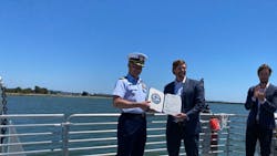 Captain Taylor Q. Lam presents Pace Ralli, CEO of SWITCH Maritime, with signed Certificate of Inspection. Captain Taylor Q. Lam presents Pace Ralli, CEO of SWITCH Maritime, with signed Certificate of Inspection.