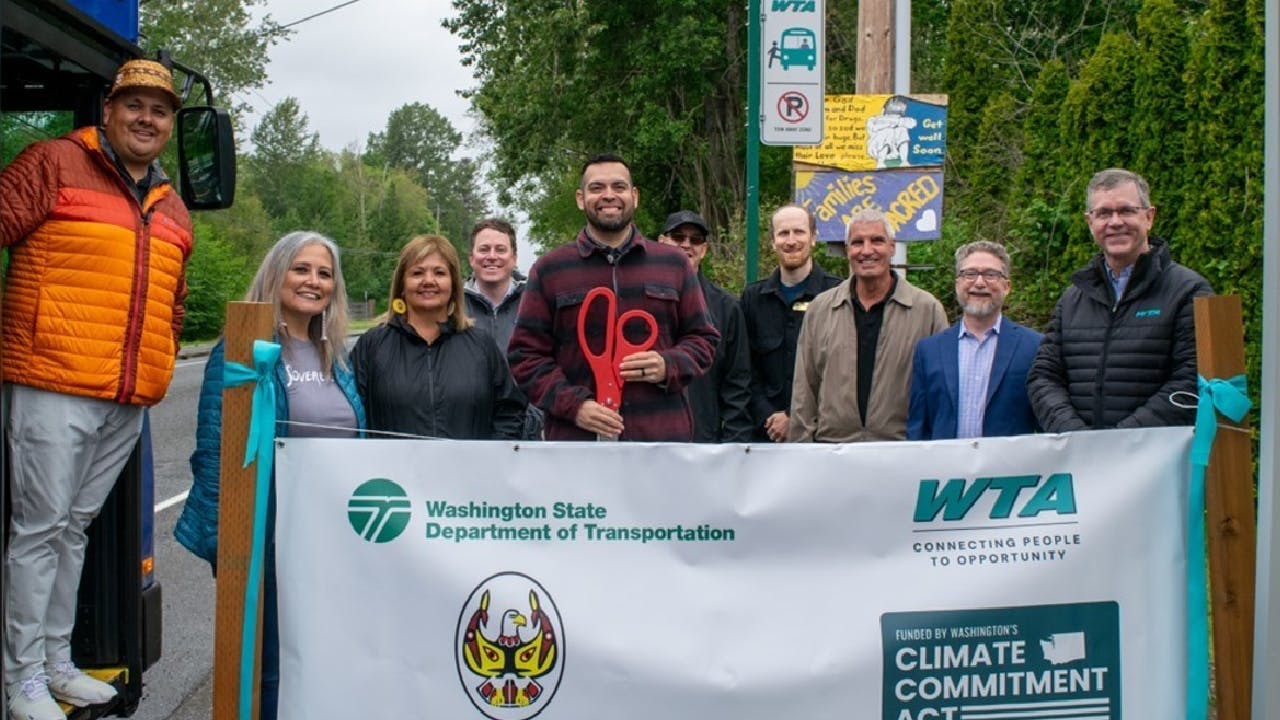From left to right: Lummi Indian Business Council Vice-Chair Terrance Adams, Lummi Indian Business Council Secretary Lisa Wilson, Lummi Indian Business Council Member Maureen Kinley, Washington State Rep. Joe Timmons (D-WA), Lummi Indian Business Council Chair Anthony Hillaire, Northwest Regional Representative from Washington State Governor Jay Inslee&rsquo;s Office, Jeremy Harrison-Smith, city of Lynden Mayor Scott Korthuis, Deputy director of the Public Transportation Division of the Washington State Department of Transportation Don Chartock and WTA General Manager, Les Reardanz.