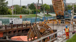 After being disassembled, parts of the TBM are carefully lifted out of the extraction shaft with a crane