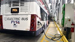 An electric bus charges in the garage at Pioneer Valley Transit Authority headquarters on Cottage Street in Springfield. Congressman Richard Neal and other officials gathered there to celebrate a $54 million Federal grant to the PVTA that will bolster their electric bus fleet and infrastructure.