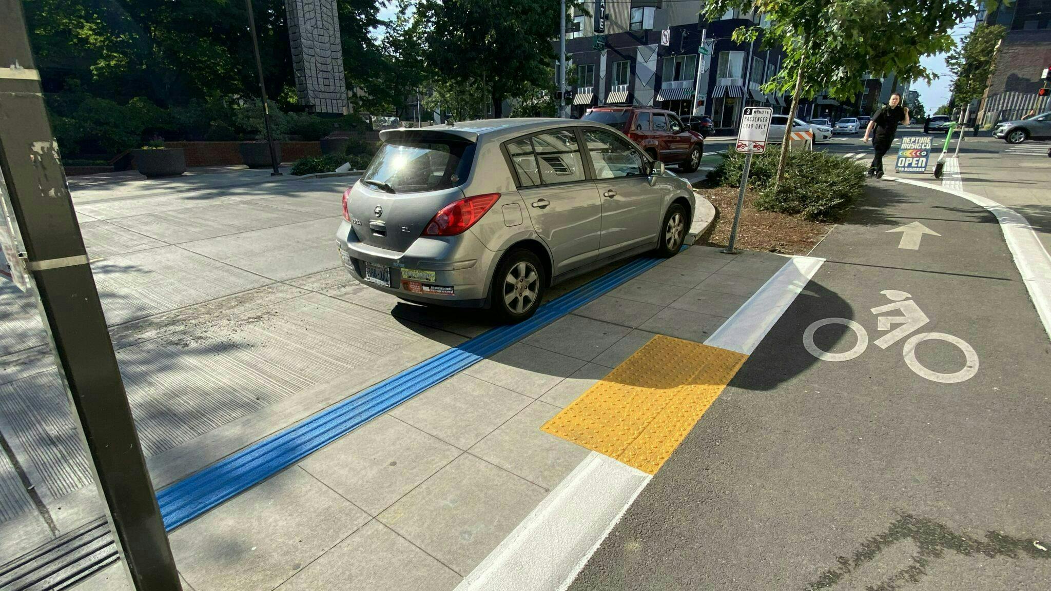 Seattle piloting tactile walking surface indicators to assist people with vision disabilities travel the city.