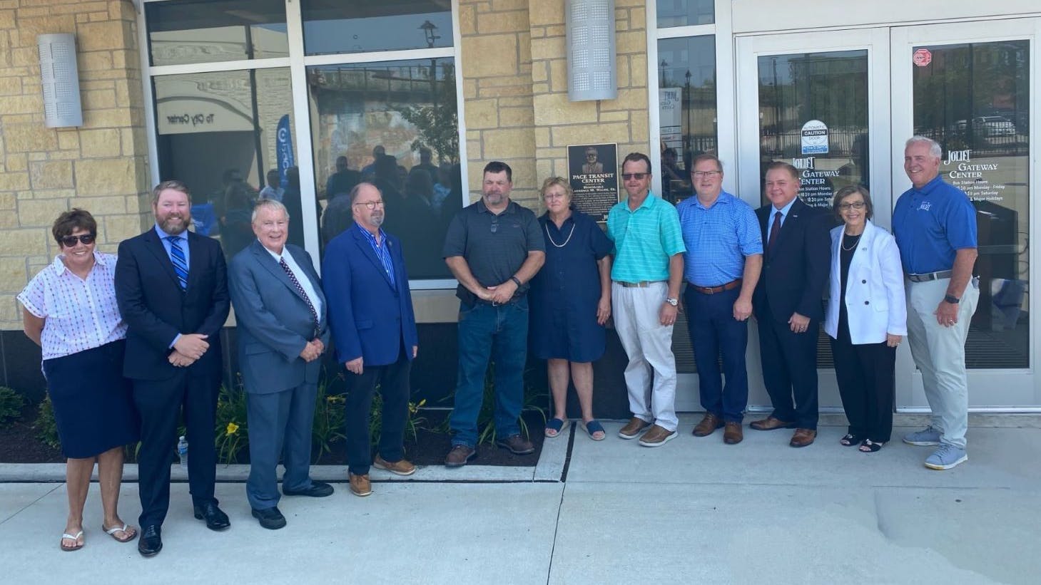 Pace holds plaque dedication at Joliet Transit center for the late Larry M. Walsh.