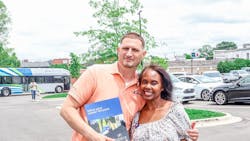 Dr. Hall with an eServe attendee at an eServe event . Dr. Hall with an eServe attendee at an eServe event .