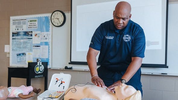 Detroit Fire Department Training Division Lt. Virgil Wyatt teaches DDOT employees how to correctly use the AEDs. 10 will be placed on board DDOT buses in the case of cardiac arrest.