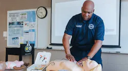 Detroit Fire Department Training Division Lt. Virgil Wyatt teaches DDOT employees how to correctly use the AEDs. 10 will be placed on board DDOT buses in the case of cardiac arrest.