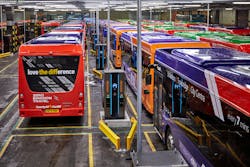 Buses being charged. Buses being charged.