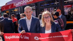 King County Executive Dow Constantine and King County Metro General Manager Michelle Allison with a piece of the ribbon at the RapidRide G Line ribbon cutting celebration. King County Executive Dow Constantine and King County Metro General Manager Michelle Allison with a piece of the ribbon at the RapidRide G Line ribbon cutting celebration.