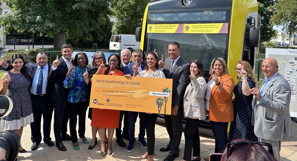 Elected and federal officials gather to celebrate the funding announcement for L.A. Metro's new light-rail line in the San Fernando Valley.