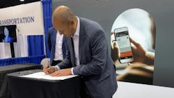 RTS CEO Miguel Velázquez signs the agreement with TRC during APTA's TRANSform conference. RTS CEO Miguel Velázquez signs the agreement with TRC during APTA's TRANSform conference.
