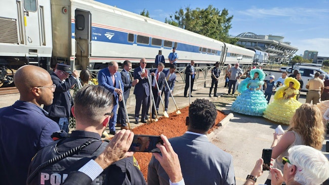 Officials gather for a groundbreaking ceremony in Mobile, Alabama.