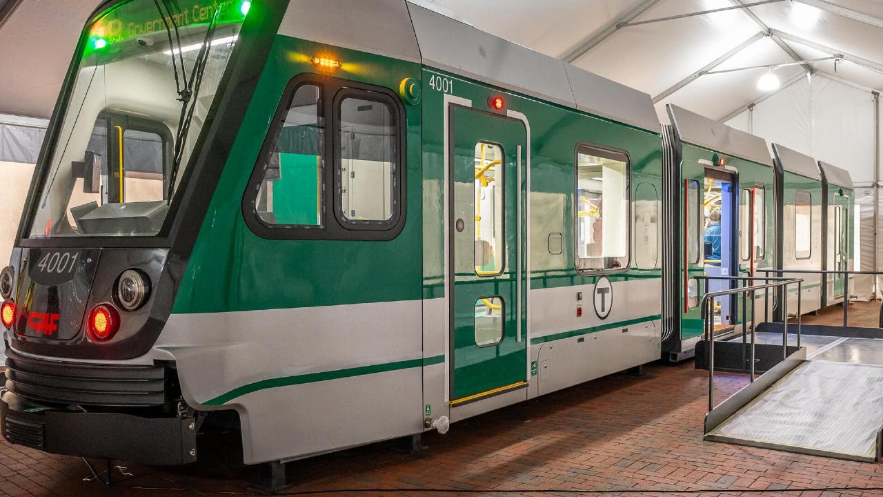 A Type 10 mockup vehicle stood displayed under a tent at City Hall Plaza.