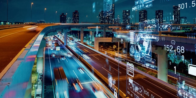 City freeway with traffic in motion at night