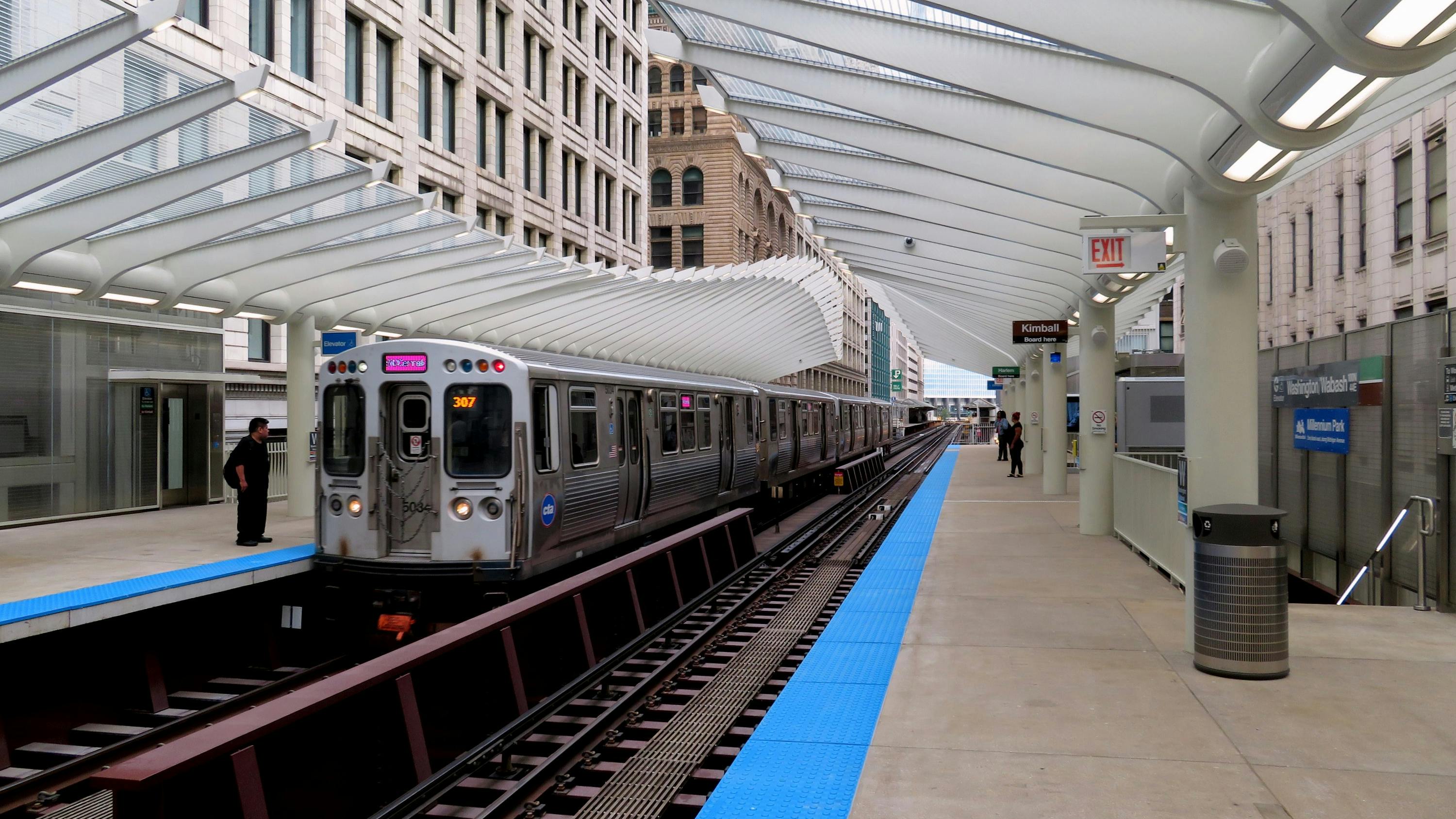 CTA pink line rail car at Washington Wabash station