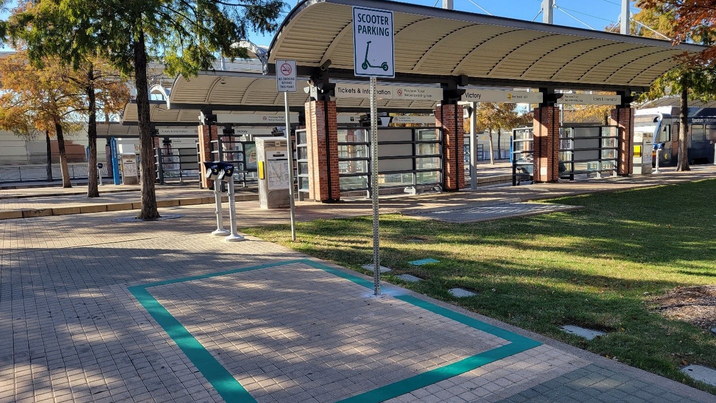 DART scooter parking zone outside of bus transfer station