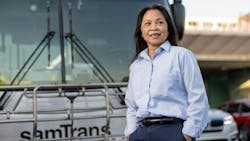 A SamTrans bus operator. A SamTrans bus operator.