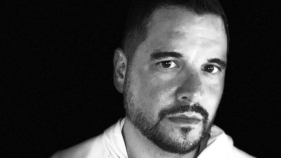 George Cassidy Payne headshot in black and white