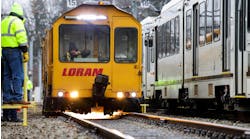 a yellow loram rail grinder operates on track a yellow loram rail grinder operates on track
