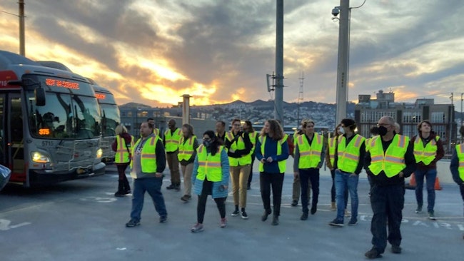 A group from the San Francisco Transit Riders touring the Potrero Yard.
