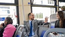Nashville Mayor Freddie O’Connell talking to residents on a transit bus. Nashville Mayor Freddie O’Connell talking to residents on a transit bus.