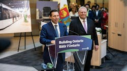 Brampton city officials stand at podium with project renderings in the background Brampton city officials stand at podium with project renderings in the background