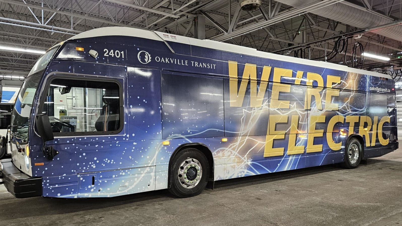 Oakville electric bus sits in bus garage