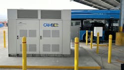 camber charger sits in front of CapMetro electric bus camber charger sits in front of CapMetro electric bus