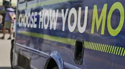 Choose How You Move sign on a WeGp bus.