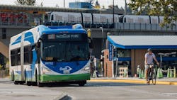 A Swift Orange Line bus drives through Lynnwood City Center Station. A Swift Orange Line bus drives through Lynnwood City Center Station.