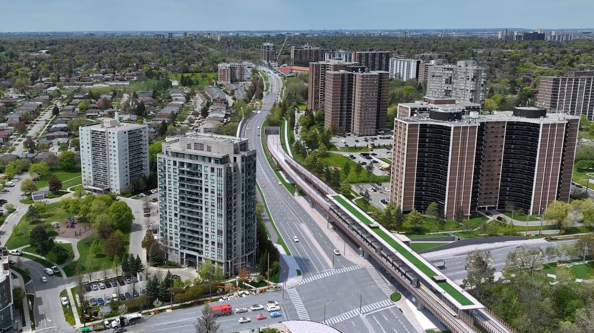 A rendering showing an aerial view of the elevated section of the Eglinton Crosstown West Extension.