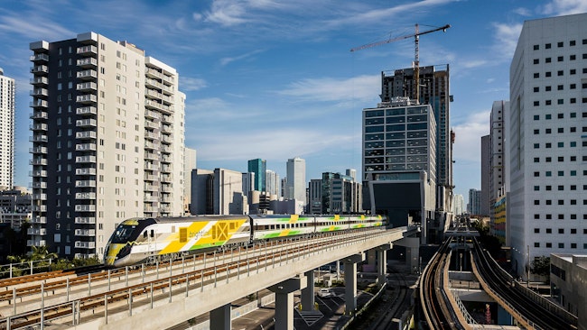 brightline florida train runs on elevated tracks