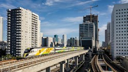 brightline florida train runs on elevated tracks brightline florida train runs on elevated tracks